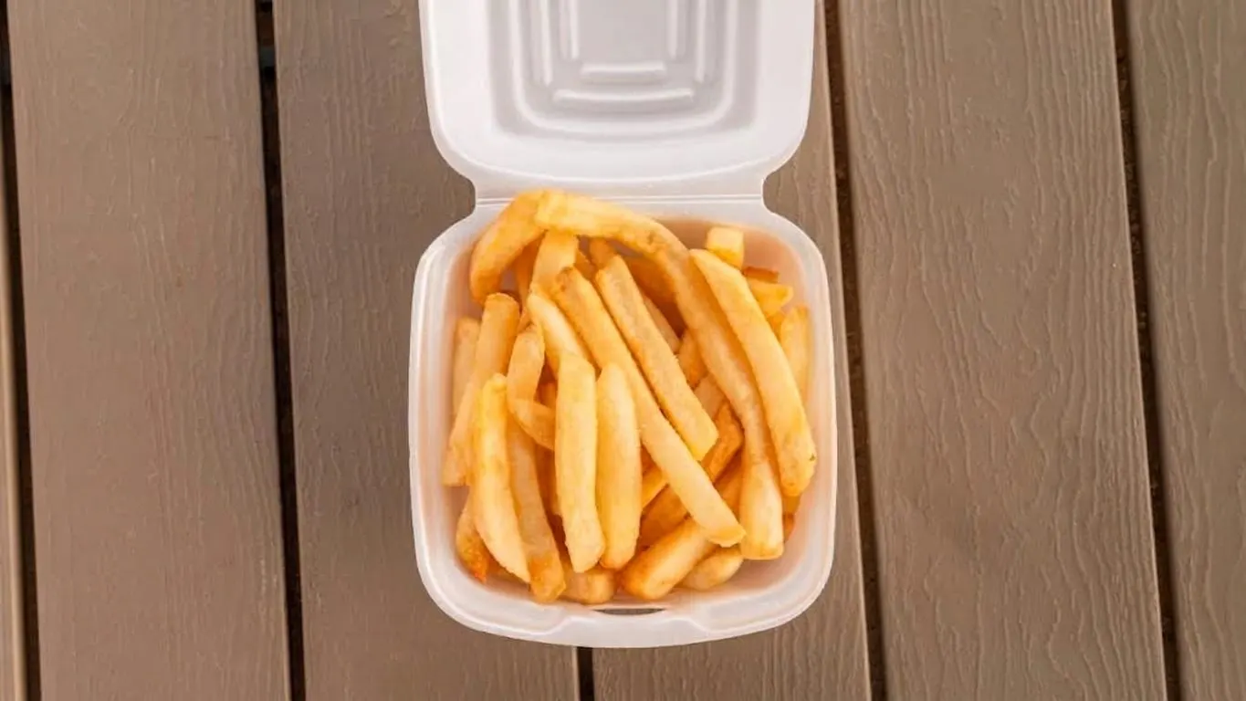 French fries in a takeout box