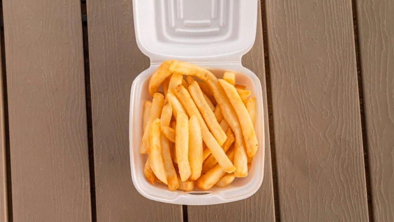 French fries in a takeout box